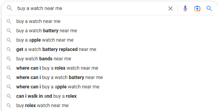 google search bar displaying "buy a watch near me"